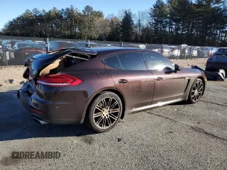 2016 Porsche Panamera 4 with VIN WP0AA2A79GL002671, listed as a Copart auction lot 87905645 with 96,048 mi miles and Salvage title. Bid and sale history available at DreamBid. Image 3.