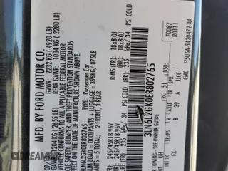 2014 Lincoln MKZ z VIN 3LN6L2GK0ER802765, wystawiony jako Copart lot #46603025 z przebiegiem 114 201 mil mil oraz Szkoda całkowita • Salvage title. Historia ofert i sprzedaży dostępna na DreamBid. Obrazek 13.