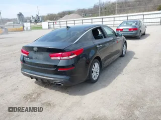 2019 Kia Optima LX with VIN 5XXGT4L33KG373375, listed as a IAAI auction lot 42005817 with 77,524 mi miles and . Bid and sale history available at carsss.com. Image 4.