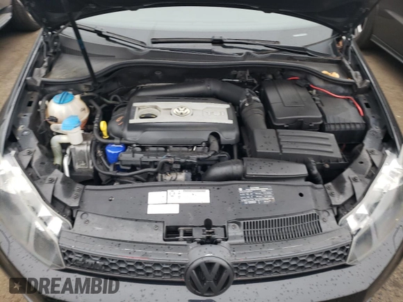 2011 Volkswagen GTI PZEV z VIN WVWHD7AJ1BW241072, wystawiony jako Copart lot #73080964 z przebiegiem 83 749 mil mil oraz Szkoda całkowita • Salvage title. Historia ofert i sprzedaży dostępna na DreamBid. Obrazek 13.
