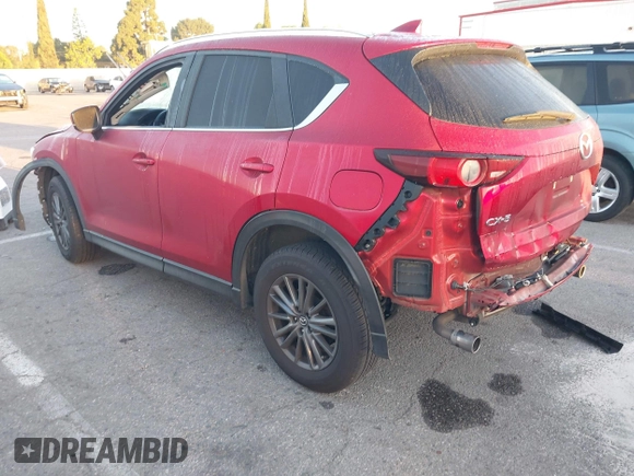 2020 Mazda CX-5 Touring z VIN JM3KFACM1L0855474, wystawiony jako IAAI lot #42004504 z przebiegiem 82 505 mil mil oraz . Historia ofert i sprzedaży dostępna na DreamBid. Obrazek 3.