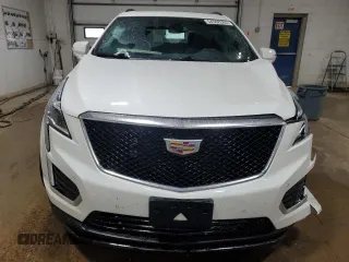 2021 Cadillac XT5 AWD Sport with VIN 1GYKNGRS5MZ142444, listed as a Copart auction lot 54502285 with 27,070 mi miles and Salvage title. Bid and sale history available at DreamBid. Image 5.
