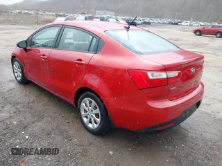 2013 Kia Rio LX with VIN KNADM4A34D6310495, listed as a IAAI auction lot 41986664 with 129,145 mi miles. Bid and sale history available at carsss.com. Image 3.