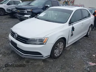 2015 Volkswagen Jetta Sedan 1.8T SE with VIN 3VWD17AJ6FM237674, listed as a IAAI auction lot 41613054 with 71,325 mi miles. Bid and sale history available at carsss.com. Image 17.