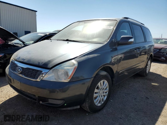 2012 Kia Sedona LX with VIN KNDMG4C71C6461660, listed as a Copart auction lot 70904534 with 163,548 mi miles and Clean Title. Bid and sale history available at carsss.com. Image 1.