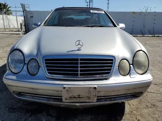 2000 Mercedes-Benz CLK 320/430 z VIN WDBLK70G8YT033575, wystawiony jako Copart lot #44710915 z przebiegiem 157 198 mil mil oraz Szkoda całkowita • Salvage title. Historia ofert i sprzedaży dostępna na DreamBid. Obrazek 5.