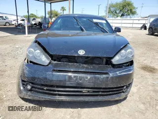 2008 Hyundai Tiburon GT z VIN KMHHN66F18U295838, wystawiony jako Copart lot #51972325 z przebiegiem 147 626 mil mil oraz Szkoda całkowita • Salvage title. Historia ofert i sprzedaży dostępna na DreamBid. Obrazek 5.