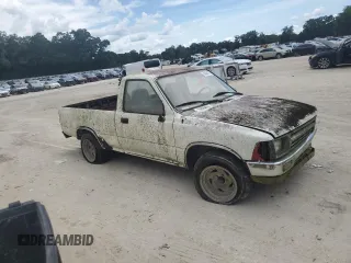 1994 Toyota Pickup with VIN JT4RN81A1R5184105, listed as a Copart auction lot 64042715 with 255,710 mi miles and Clean title. Bid and sale history available at DreamBid. Image 4.