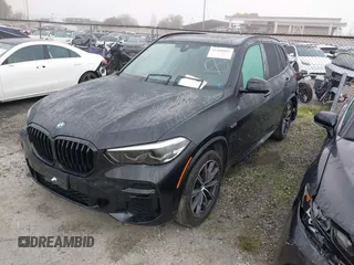 2022 BMW X5 xDrive45e with VIN 5UXTA6C09N9M81408, listed as a IAAI auction lot 41448822 with 35,147 mi miles. Bid and sale history available at carsss.com. Image 2.