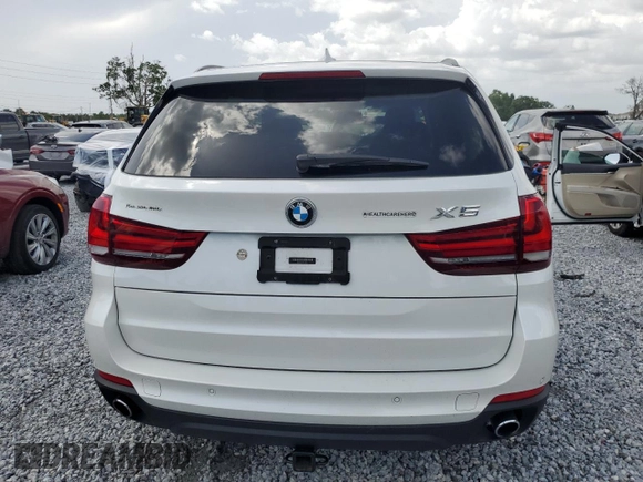 2015 BMW X5 xDrive35i z VIN 5UXKR0C58F0P03231, wystawiony jako Copart lot #60964305 z przebiegiem 71 419 mil mil oraz Szkoda całkowita • Salvage title. Historia ofert i sprzedaży dostępna na DreamBid. Obrazek 6.