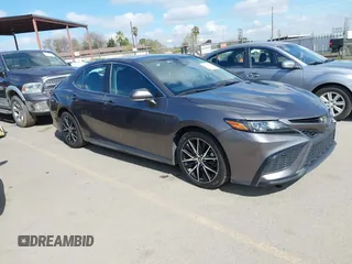 2022 Toyota Camry SE with VIN 4T1G11AK1NU499064, listed as a IAAI auction lot 41734310 with 87,159 mi miles and . Bid and sale history available at DreamBid. Image 1.