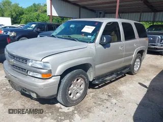 2005 Chevrolet Tahoe Z71 z VIN 1GNEC13TX5R195172, wystawiony jako IAAI lot #42080152 z przebiegiem 132 905 mil mil oraz . Historia ofert i sprzedaży dostępna na DreamBid. Obrazek 2.