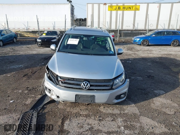 2013 Volkswagen Tiguan S with VIN WVGAV3AX0DW572915, listed as a IAAI auction lot 41937763 with 65,136 mi miles and . Bid and sale history available at DreamBid. Image 12.