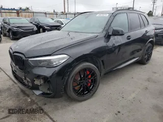 2021 BMW X5 M z VIN 5YMJU0C0XM9H13455, wystawiony jako Copart lot #59625375 z przebiegiem Nie podano mil oraz Szkody całkowita. Historia ofert i sprzedaży dostępna na DreamBid. Obrazek 1.