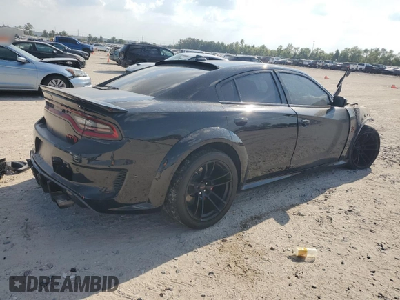 2022 Dodge Charger SRT Hellcat Widebody z VIN 2C3CDXL91NH106016, wystawiony jako Copart lot #72100084 z przebiegiem Nie podano mil oraz Nie do naprawy • Non repairable. Historia ofert i sprzedaży dostępna na DreamBid. Obrazek 3.