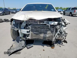 2014 Chevrolet Impala LTZ with VIN 1G1155S32EU149061, listed as a Copart auction lot 52488535 with 106,815 mi miles and Salvage title. Bid and sale history available at DreamBid. Image 5.