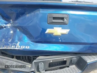 2017 Chevrolet Silverado 1500 LT with VIN 3GCUKREC8HG462719, listed as a IAAI auction lot 41940176 with 380,676 mi miles and . Bid and sale history available at DreamBid. Image 6.