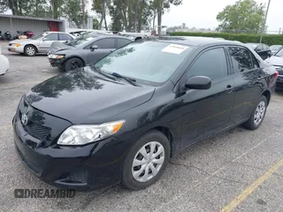 2010 Toyota Corolla with VIN 1NXBU4EE1AZ285449, listed as a IAAI auction lot 42040668 with 121,404 mi miles and . Bid and sale history available at carsss.com. Image 18.