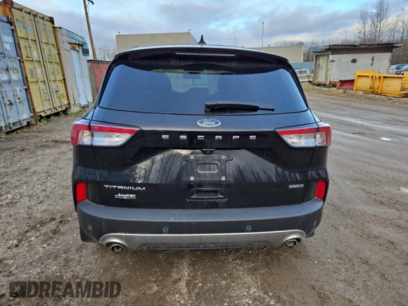 2021 Ford Escape Titanium Hybrid с VIN 1FMCU9DZ1MUA60443, выставлен на аукционе Copart как лот 80559254 с пробегом 30 968 миль миль и Списание • Salvage title. История ставок и продаж доступна на DreamBid. Изображение 6.