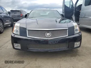 2006 Cadillac XLR z VIN 1G6YX36D465603297, wystawiony jako Copart lot #74231644 z przebiegiem Nie podano mil oraz Szkody całkowita. Historia ofert i sprzedaży dostępna na DreamBid. Obrazek 5.