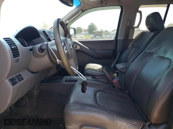 2010 Nissan Frontier Pro-4X with VIN 1N6AD0EV1AC447205, listed as a Copart auction lot 62007355 with 128,371 mi miles and Clean title. Bid and sale history available at DreamBid. Image 7.