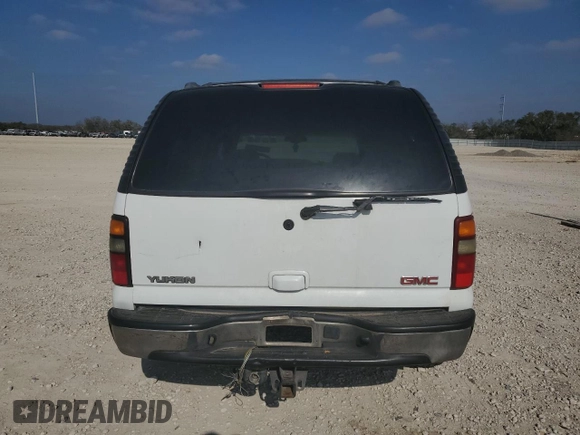 2005 GMC Yukon SLT z VIN 1GKEC13T05J143724, wystawiony jako Copart lot #44611845 z przebiegiem 197 183 mil mil oraz Szkoda całkowita • Salvage title. Historia ofert i sprzedaży dostępna na DreamBid. Obrazek 6.