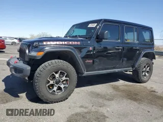 2021 Jeep Wrangler Unlimited Rubicon with VIN 1C4HJXFN4MW517400, listed as a Copart auction lot 52959495 with 31,874 mi miles and Salvage Title. Bid and sale history available at carsss.com. Image 1.