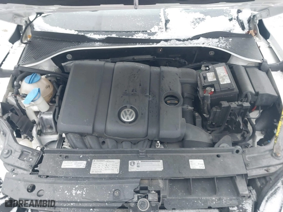 2012 Volkswagen Passat SE with VIN 1VWBP7A35CC052679, listed as a IAAI auction lot 41268199 with 125,691 mi miles. Bid and sale history available at carsss.com. Image 10.
