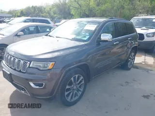 2017 Jeep Grand Cherokee Overland z VIN 1C4RJECG1HC614740, wystawiony jako IAAI lot #41912523 z przebiegiem 177 353 mil mil oraz . Historia ofert i sprzedaży dostępna na DreamBid. Obrazek 20.