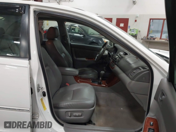 2005 Toyota Camry LE with VIN 4T1BF30KX5U083054, listed as a IAAI auction lot 41814022 with 195,608 mi miles and . Bid and sale history available at DreamBid. Image 5.