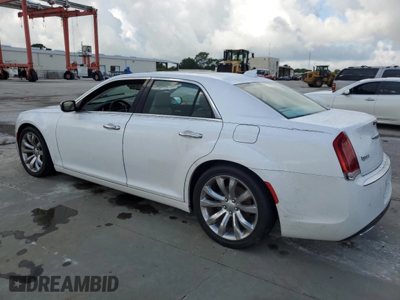 2015 Chrysler 300 C with VIN 2C3CCAET3FH830414, listed as a Copart auction lot 73649014 with Not Provided miles and Salvage Title. Bid and sale history available at DreamBid. Image 2.