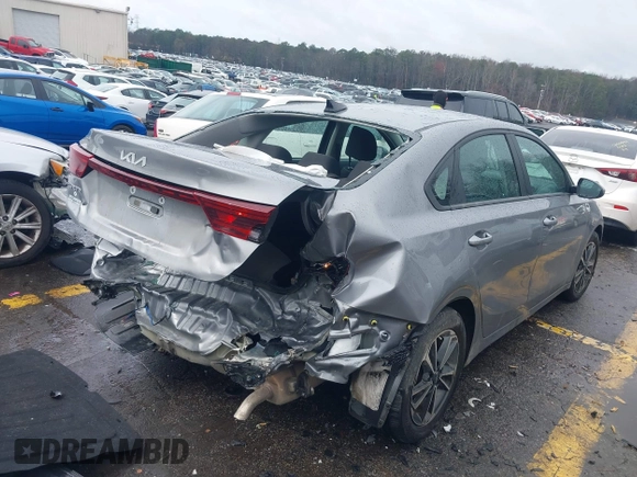 2024 Kia Forte LXS with VIN 3KPF24AD7RE711101, listed as a IAAI auction lot 41764290 with 30,395 mi miles and . Bid and sale history available at DreamBid. Image 4.
