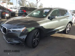 2019 Volvo XC60 Momentum with VIN LYV102RKXKB196748, listed as a IAAI auction lot 41261328 with 74,925 mi miles and . Bid and sale history available at DreamBid. Image 18.