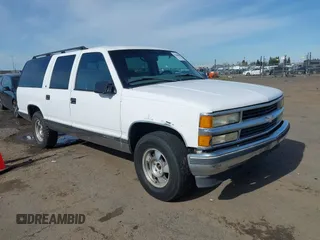 1997 Chevrolet Suburban with VIN 3GNFK16R4VG126095, listed as a IAAI auction lot 41548470 with 290,502 mi miles. Bid and sale history available at carsss.com. Image 1.