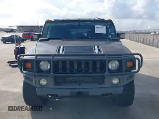 2006 Hummer H2 with VIN 5GRGN23U66H120601, listed as a IAAI auction lot 41524634 with 155,003 mi miles. Bid and sale history available at carsss.com. Image 12.