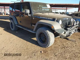2012 Jeep Wrangler Unlimited Rubicon with VIN 1C4HJWFG5CL276765, listed as a IAAI auction lot 41265686 with 121,096 mi miles and . Bid and sale history available at DreamBid. Image 1.