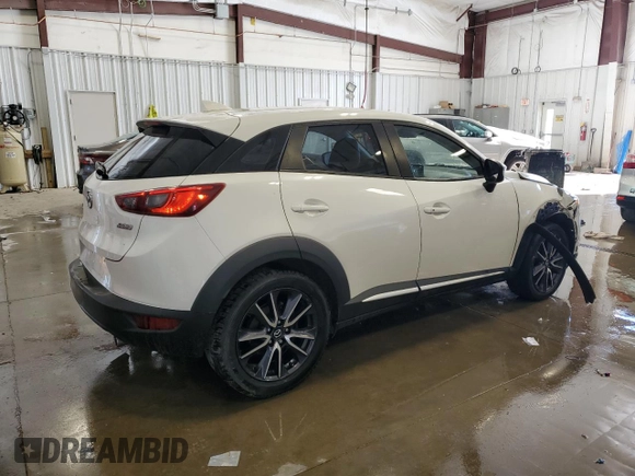 2018 Mazda CX-3 Grand Touring z VIN JM1DKFD7XJ0321776, wystawiony jako Copart lot #49093765 z przebiegiem 94 770 mil mil oraz Tytuł czysty. Historia ofert i sprzedaży dostępna na DreamBid. Obrazek 3.
