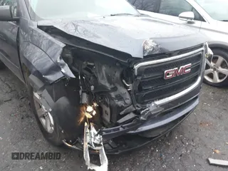 2014 GMC Acadia SLE with VIN 1GKKRNED4EJ148388, listed as a IAAI auction lot 41418938 with Not Provided miles and . Bid and sale history available at carsss.com. Image 6.