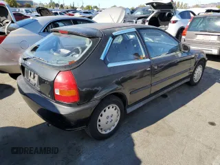 1997 Honda Civic DX with VIN 2HGEJ6344VH119405, listed as a Copart auction lot 71070544 with 26,621 mi miles and Salvage Title. Bid and sale history available at carsss.com. Image 3.