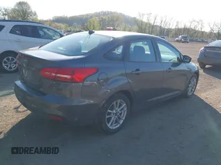 2016 Ford Focus SE с VIN 1FADP3F21GL274734, выставлен на аукционе IAAI как лот 42101168 с пробегом 98 404 миль миль и . История ставок и продаж доступна на DreamBid. Изображение 4.