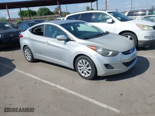 2012 Hyundai Elantra GLS with VIN 5NPDH4AE3CH137842, listed as a IAAI auction lot 42077110 with 157,645 mi miles. Bid and sale history available at carsss.com. Image 1.