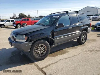 2002 Jeep Grand Cherokee Laredo with VIN 1J4GW48S82C241889, listed as a Copart auction lot 46252045 with 215,697 mi miles and Salvage Title. Bid and sale history available at carsss.com. Image 1.