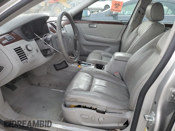 2006 Cadillac DTS 1SD z VIN 1G6KD57Y26U115094, wystawiony jako Copart lot #53534355 z przebiegiem 126 631 mil mil oraz Szkoda całkowita • Salvage title. Historia ofert i sprzedaży dostępna na DreamBid. Obrazek 7.