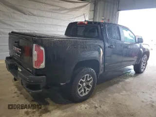 2021 GMC Canyon 4WD AT4 w/Leather with VIN 1GTG6FEN8M1255144, listed as a Copart auction lot 50186815 with 43,610 mi miles and Salvage Title. Bid and sale history available at carsss.com. Image 3.