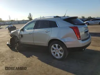 2013 Cadillac SRX Performance Collection with VIN 3GYFNDE32DS618080, listed as a Copart auction lot 48646985 with 100,309 mi miles and Salvage Title. Bid and sale history available at carsss.com. Image 2.