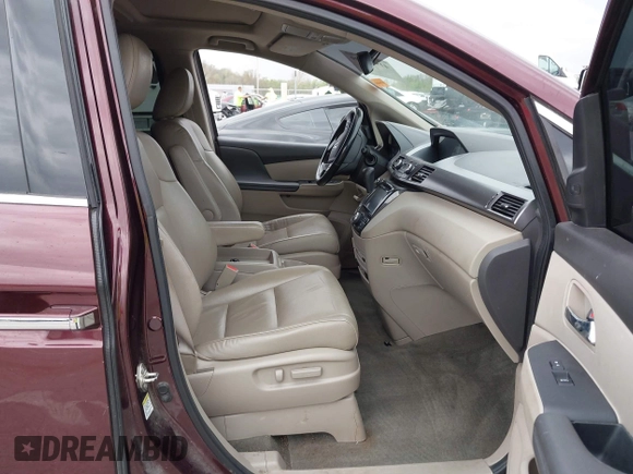 2014 Honda Odyssey Touring with VIN 5FNRL5H94EB127695, listed as a IAAI auction lot 41936109 with 221,786 mi miles and . Bid and sale history available at DreamBid. Image 5.