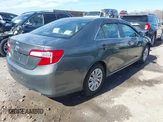 2013 Toyota Camry L with VIN 4T4BF1FK8DR280756, listed as a IAAI auction lot 41699710 with 200,466 mi miles. Bid and sale history available at carsss.com. Image 4.