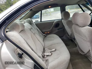 1997 Pontiac Bonneville SE z VIN 1G2HX52K7VH211607, wystawiony jako Copart lot #73705454 z przebiegiem 116 307 mil mil oraz Szkoda całkowita • Salvage title. Historia ofert i sprzedaży dostępna na DreamBid. Obrazek 10.