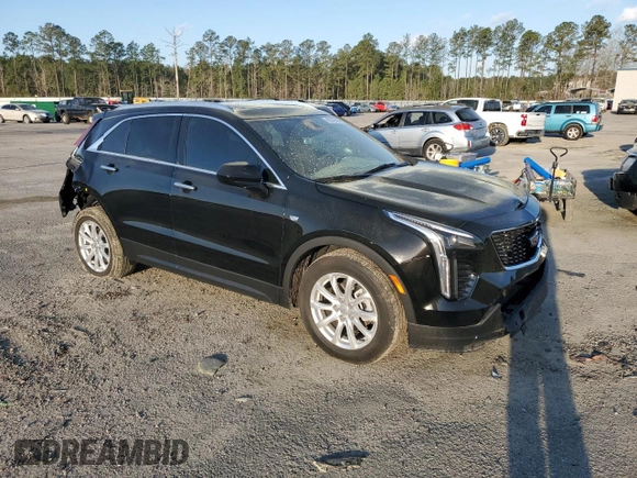 2023 Cadillac XT4 FWD Luxury with VIN 1GYAZAR49PF102307, listed as a Copart auction lot 49342465 with 21,093 mi miles and Salvage Title. Bid and sale history available at DreamBid. Image 4.