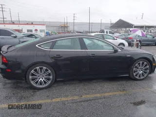 2014 Audi A7 3.0 Prestige with VIN WAU2GAFC5EN090233, listed as a IAAI auction lot 41565942 with 199,890 mi miles. Bid and sale history available at carsss.com. Image 14.